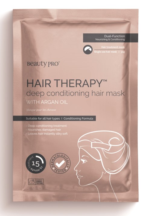En rosa förpackning av Beauty PRO Hair Therapy djupt villkorsbehandlande hårmask med arganolja, lämplig för alla hårtyper.