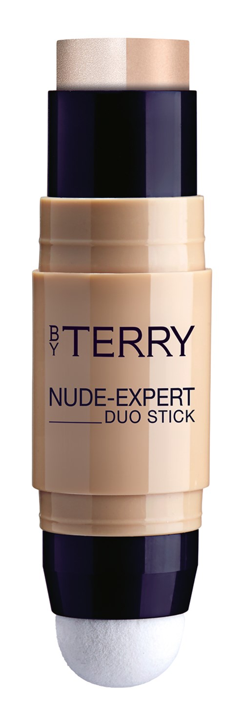 Ett beige pinne med svart lock, märkt "BY TERRY NUDE-EXPERT DUO STICK."