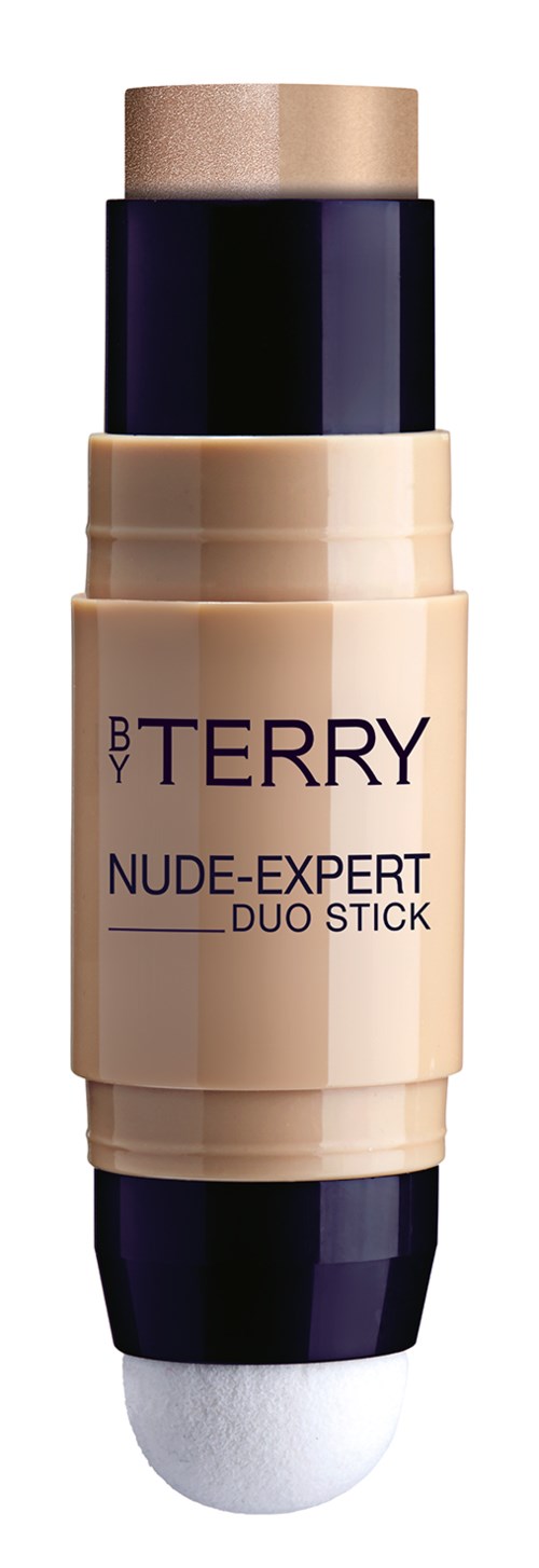 Ett beige makeup-stift med svarta och vita delar, märkt 'BY TERRY NUDE-EXPERT DUO STICK'.