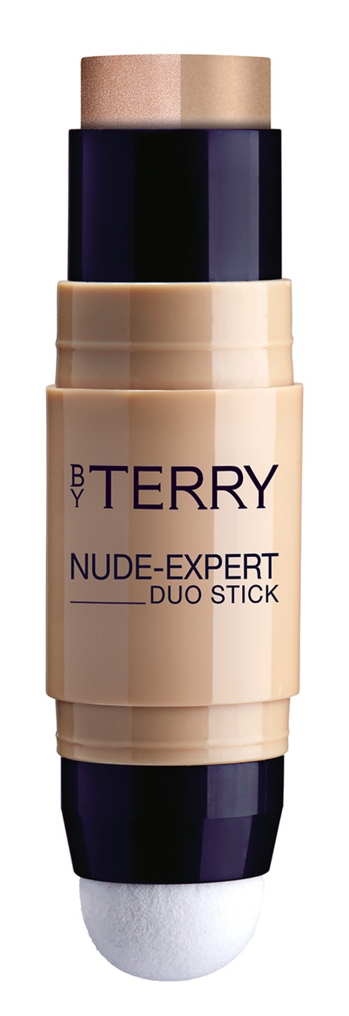 En makeup-termin merket 'BY TERRY NUDE-EXPERT DUO STICK' med en beige kropp og svart hette.