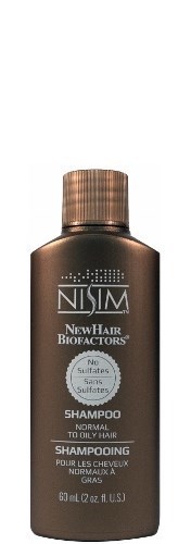 En mørk flaske med NISIM New Hair Biofactors shampoo, mærket til almindeligt hår, med skruehætte.