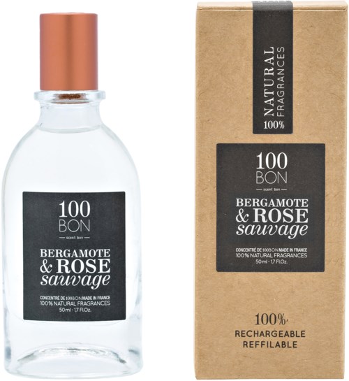 En parfyllråda och en box med etiketter som nämner bergamot och ros, båda är naturliga och återfyllbara.
