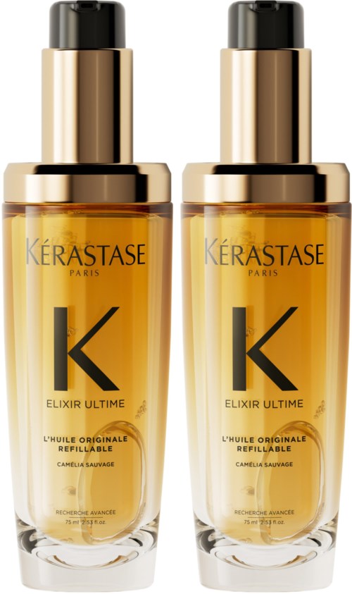 Två identiska flaskor av Kerastase Elixir Ultime hårolja, guldfärgade med svarta lock och stor 'K'-logga.