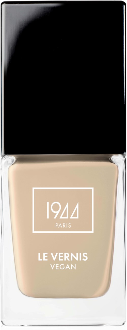 Vegansk nagellacksflaska märkt 'LE VERNIS' från Paris, med svart lock och beige nagellack.