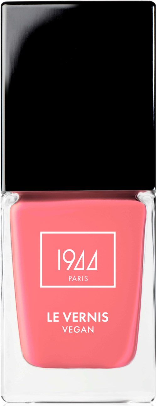 Rosafarvet veganskt nagellack med svart lock och vit text, står '1944 Paris Le Vernis Vegan.'