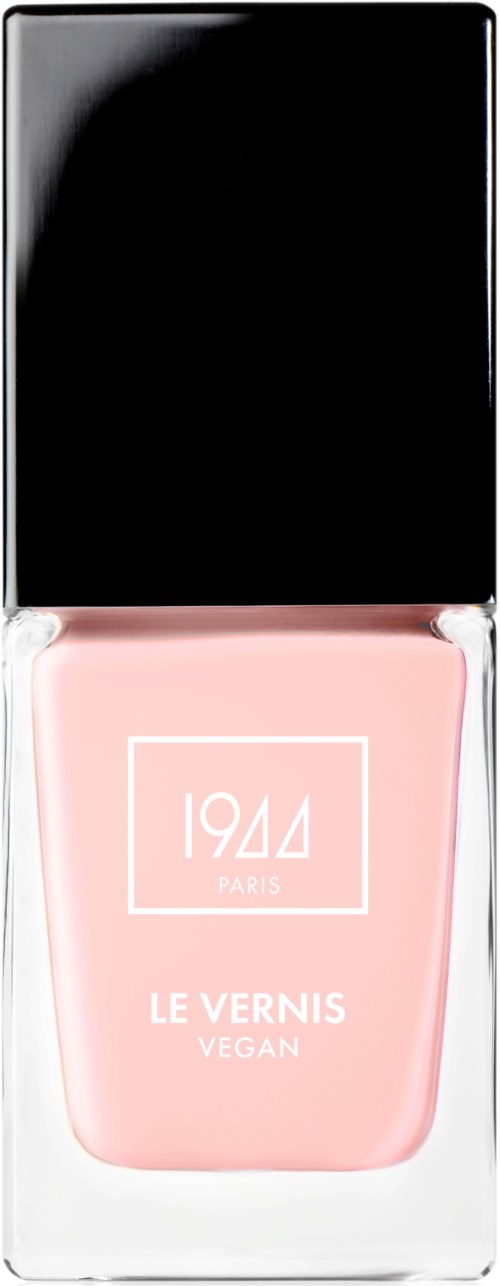 Ljusrosa nagellackflaska med svart lock, märkt '1944 PARIS LE VERNIS VEGAN'.