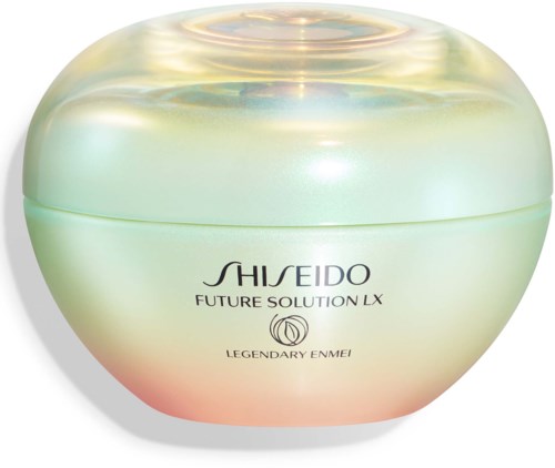 En rund kosmetikask med ett glänsande, iriserande lock och pastellfärgad kropp. Den har märkena Shiseido och Legendary Enmei.