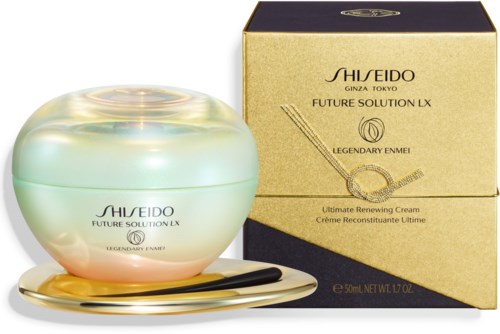 En burk och box med Shiseido Future Solution LX lyxansiktskräm med gulddetaljer och elegant förpackning.