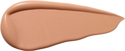 Ett streck av beige flytande makeup eller lotion på en vit bakgrund.