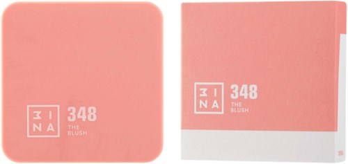 Pink blush-kompakt med emballage. Begge har hvid logo og tekst, der angiver det er til makeup.