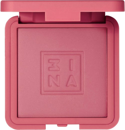 En lyserød makeup blush kompakt med lukket låg, med et forhøjet logo i midten. Blushen indeni er også lyserød.