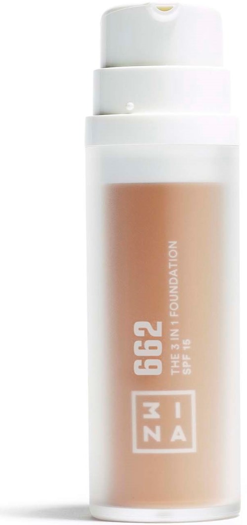 Butelka podkładu z pompką, oznaczona "ZAO THE IN SKIN FOUNDATION" na białym tle.