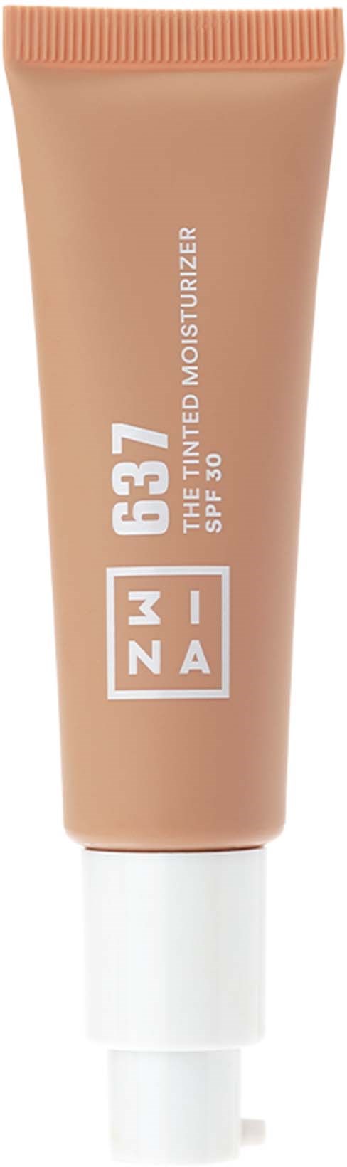 En beige tub med fuktkräm med vit lock och text på framsidan, märkt 'ZM 637 The Tinted Moisturizer SPF 30.'