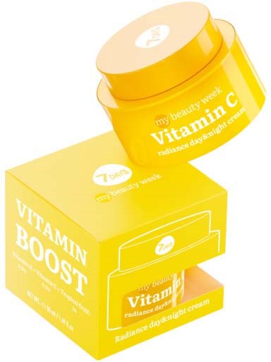 A yellow jar and box of Vitamin C skincare products, with labels indicating brightness and radiance benefits.