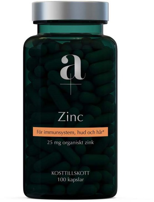 A dark green bottle labeled 'Zinc' with 100 capsules inside, meant for immune system, skin, and hair health.