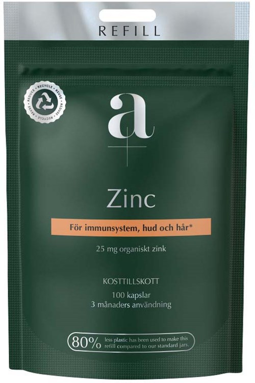 En grønn pakke med hvit topp etikett som sier 'Refill' og 'Zinc'. Den inneholder 100 kapsler for immunforsvar og hudhelse.