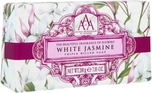 Opakowanie mydła z białymi i różowymi kwiatami, etykieta mówi 'White Jasmine' z wagą mydła.