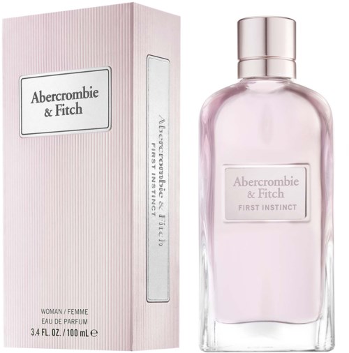 Ljusrosa box och parfymflaska med Abercrombie & Fitch First Instinct etikett.