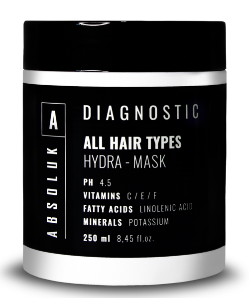 Mustavalkoinen rasia, jossa lukee 'ABSOLUK DIAGNOSTIC ALL HAIR TYPES HYDRA-MASK' ja sisältää tietoa pH, vitamiineista, rasvahapoista ja kivennäisaineista.