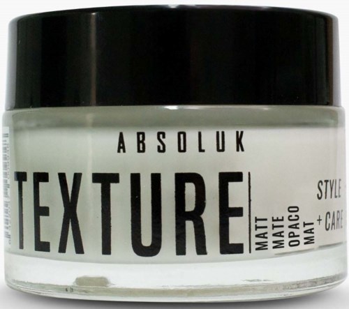 En glas med AbsoluK Texture mat hårstylingsprodukt med sort låg og hvid etikette.