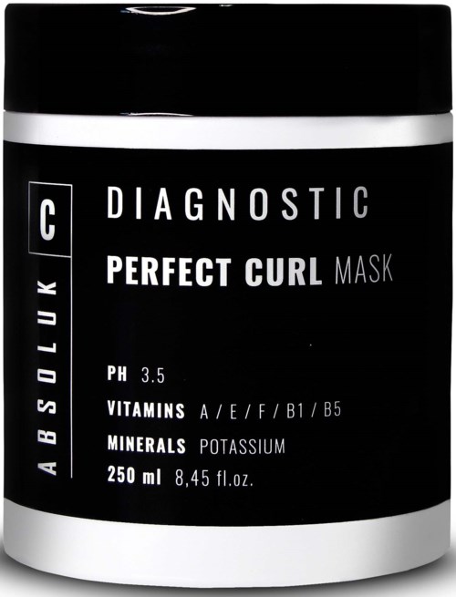 En sort beholder med hvid og grå tekst til et hårmaskeprodukt kaldet Absolute UK Perfect Curl Mask.
