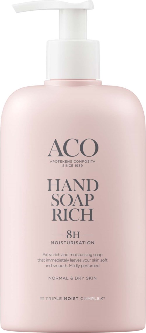 Een roze fles handzeep met pomp, label 'ACO HAND SOAP RICH', voor normale en droge huid.