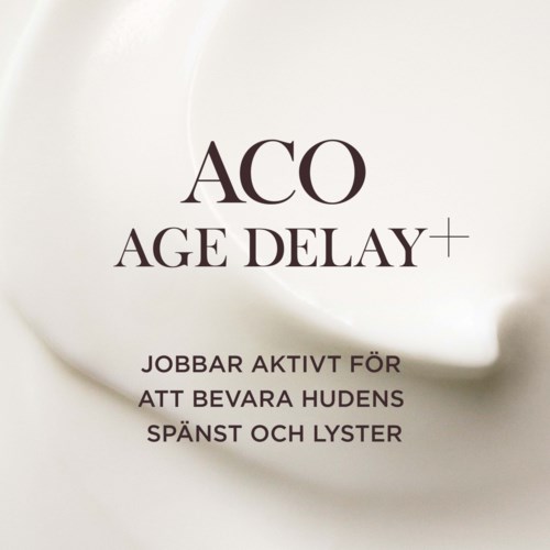 En hudvårdsprodukt som heter 'ACO Age Delay+' med svensk text om att arbeta för att bevara hudens lyster och glans.
