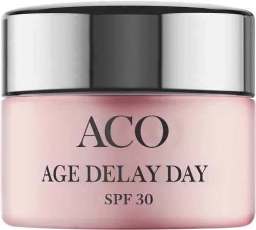 Ein Cremetiegel mit 'AGE DELAY DAY' Beschriftung, SPF 30, rosa Körper und silberner Deckel.