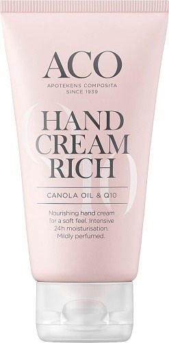 En blid rosa tube med håndcreme mærket 'ACO Hand Cream Rich' med ingredienser som rapsolie og Q10.