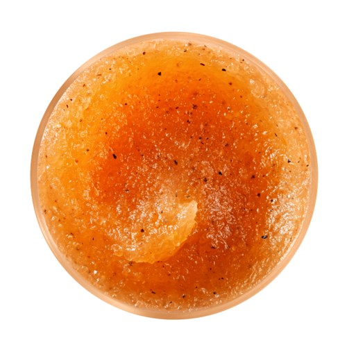 En rund, oransje frukt med svarte prikker, muligens en grapefrukt eller appelsin sett ovenfra.