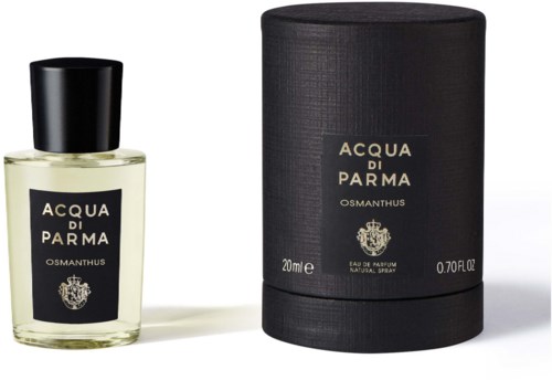 Mała butelka perfum w szklanej butelce z napisem 'Acqua di Parma Osmanthus' obok czarnego cylindrycznego pudełka.