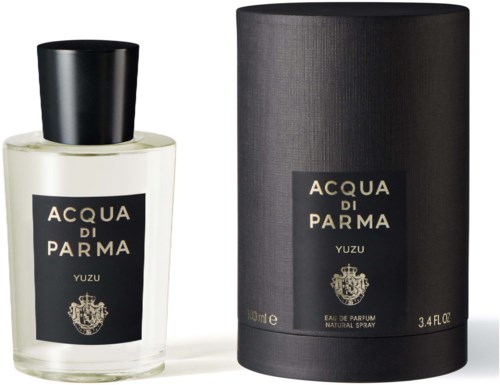 En parfymeflaske og dens cylindriske æske, begge mærket 'Acqua di Parma Yuzu,' vises side om side.