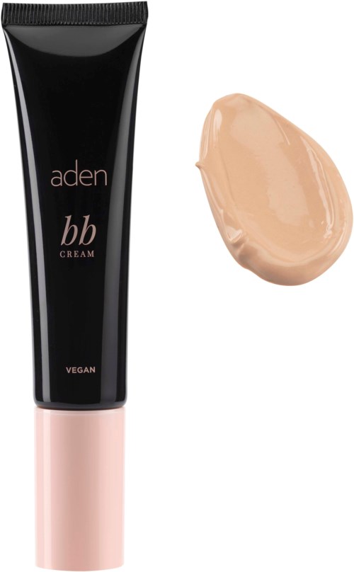 En svart tube merket 'aden bb cream' med en beige farget krem ved siden av.
