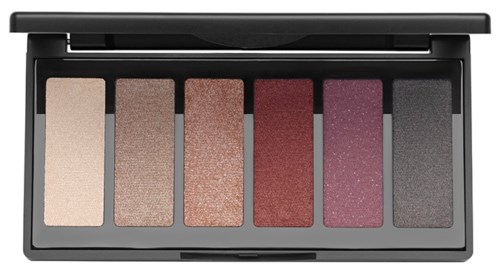 En sminkpalett med sex ögonskuggfärger från ljust till mörkt, inklusive beige, koppar, rosa, rött, lila och grått.