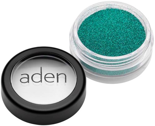 A small container of green glitter next to a round container with "aden" written on it.