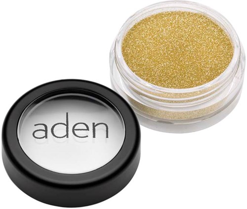 En liten rund beholder med gullglitter og lokk merket 'aden'.