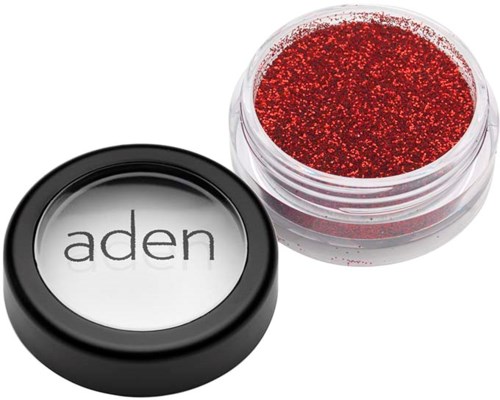 Roter Glitzer in einem kleinen runden Behälter mit "aden" auf dem Deckel.