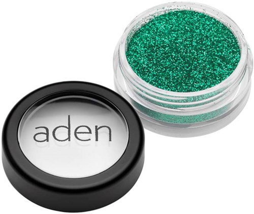 Green glitter in a clear container with a black lid labeled 'aden'.
