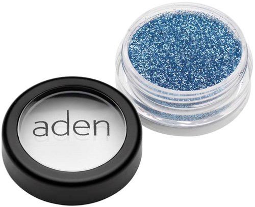 A small container with blue glitter and a lid showing the brand name 'aden'.