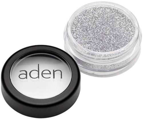 En liten krukke med sølvglitter og en beholder med ordet 'aden'.