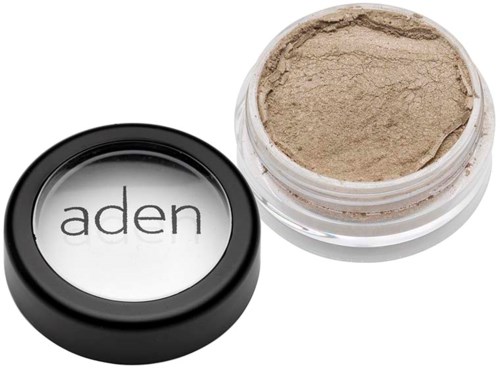 En lille beholder med beige pulver med sort låg mærket "aden." Låget er af, og pulveret er synligt.