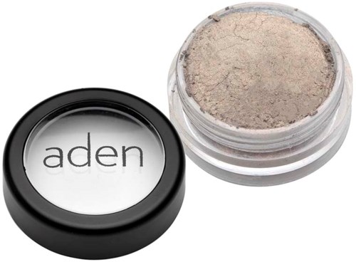 En lille beholder med beige pulver og låg med 'aden' skrevet på.