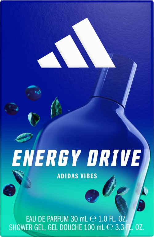 Butelka żelu pod prysznic Adidas Energy Drive z niebieskim i zielonym opakowaniem, otoczona jagodami i liśćmi.
