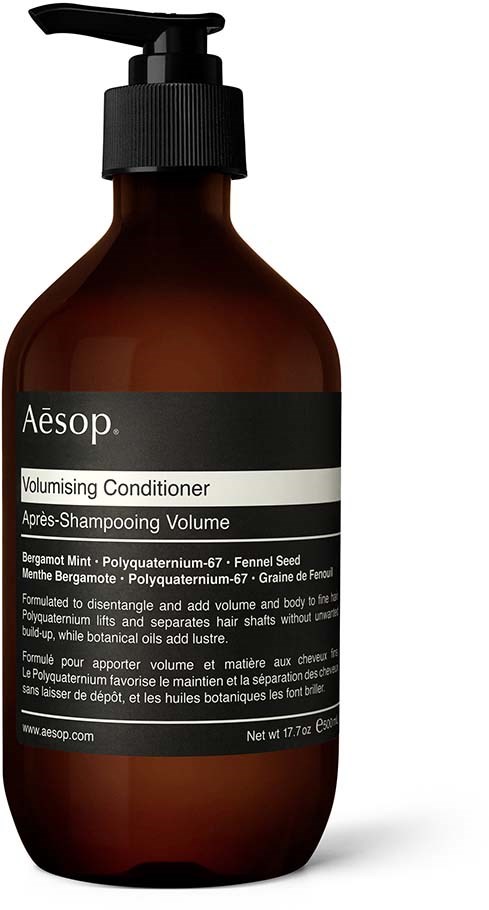 A brown bottle with a black pump labeled as volumising conditioner, contains hair care product, net weight 17 fluid ounces.