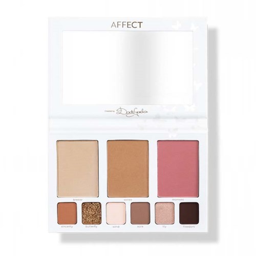 A makeup palette with four blushes and six eyeshadow shades, labeled with names like cinnamon and sparkle.