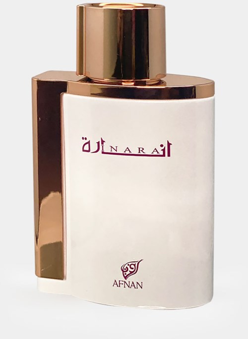 A white perfume bottle with gold cap and accents, featuring brand names and logos on the front.