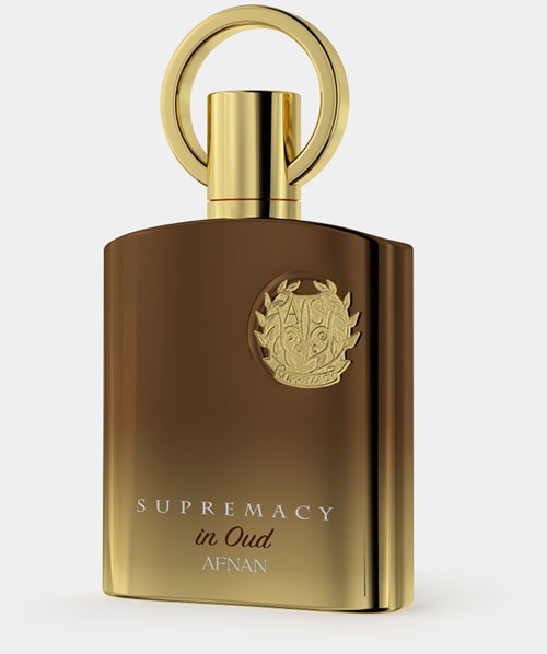 Hajuvesipullo, jossa kultaistuva korkki, ruskea ja kultainen runko, ja siinä lukee "Supremacy in Oud".