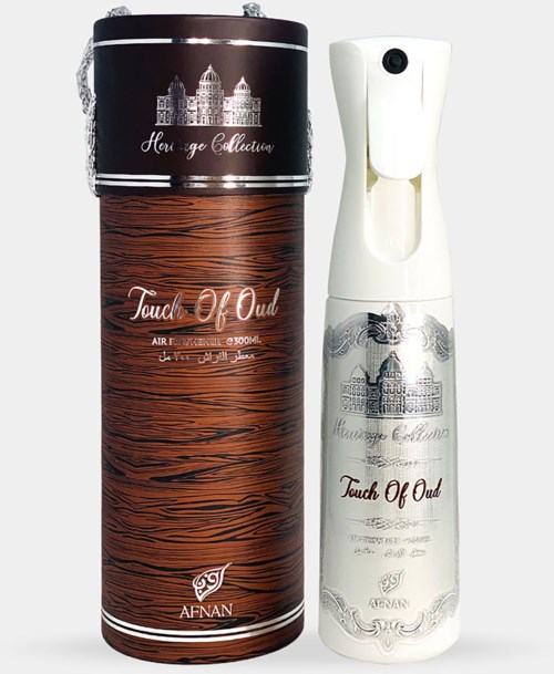 Hajuvesipullo ja sen munan, molemmat nimeltä 'Touch of Oud' ja 'Heritage Collection.'