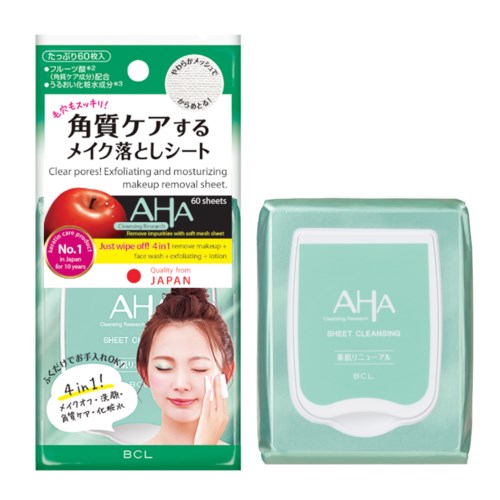 Pakningen viser en kvinne med håndkle på hodet som bruker en ansiktsmaske, grønn eske med japansk tekst og en liten gjennomsiktig beholder.