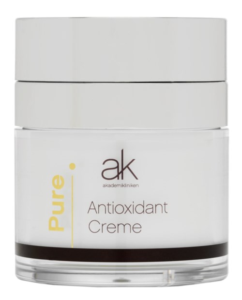 En vit burk märkt 'Pure' och 'Antioxidant Creme' med initialerna 'ak' på.